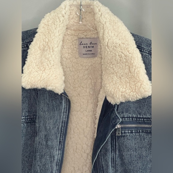 Blue Denim Jacket lined with sherpa inside. Sinched waist with attached belt. - Picture 2 of 4